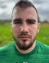 Adrian UŚĆ